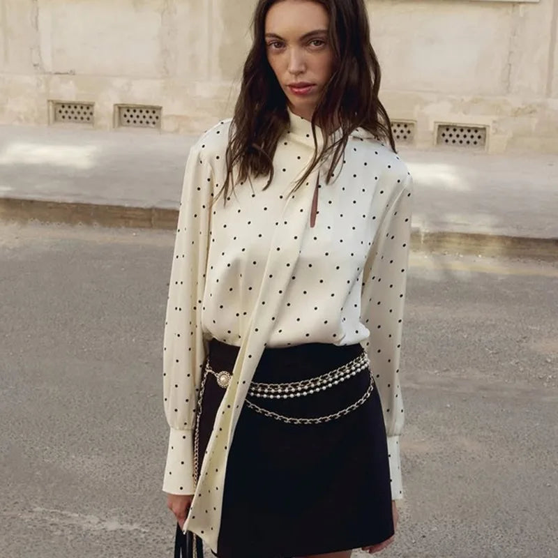 Polka dot long-sleeve blouse with scarf-tie detail and V-neckline