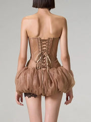 Lace corset top with layered mini skirt shown on model