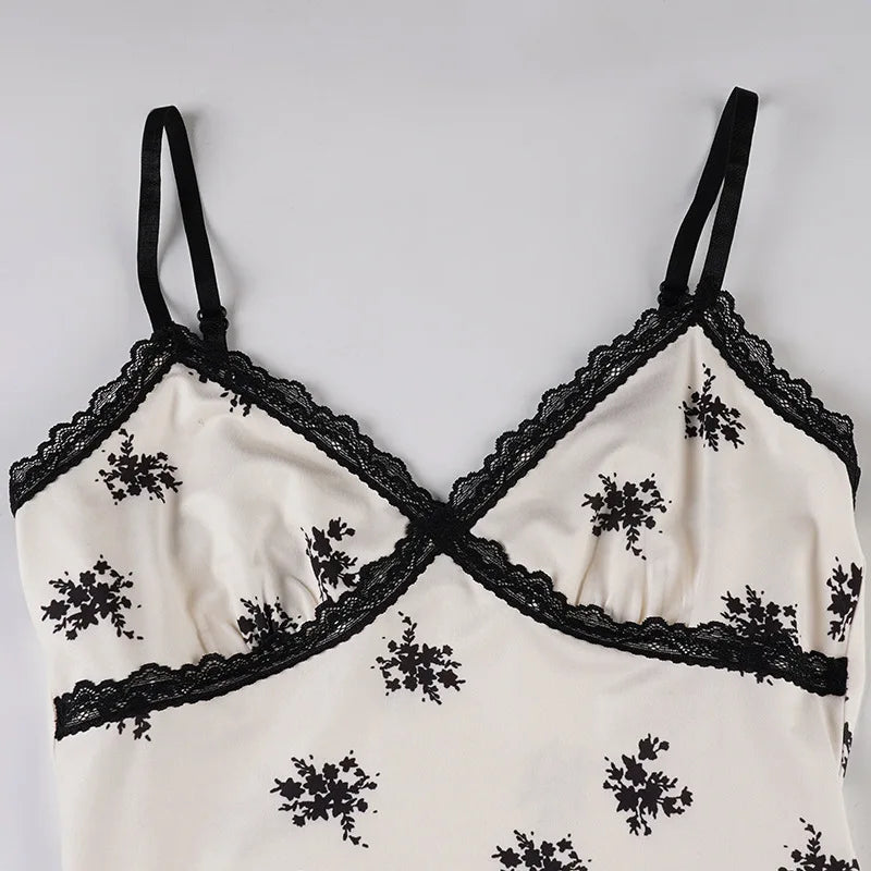 Black lace-retro-inspired lightweight summer dress with feminine details on a white background