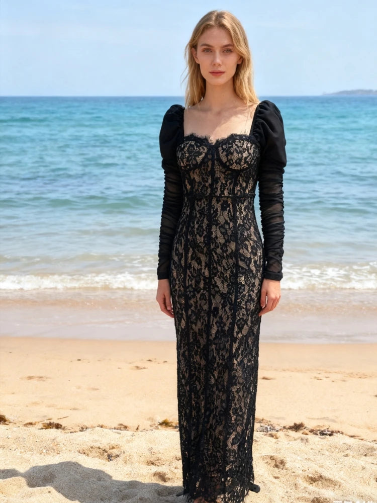 Close-up of puff sleeves and lace detailing on a black gown