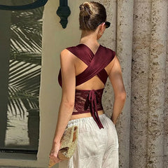 Close view of lace texture on a halter V-neck crop top