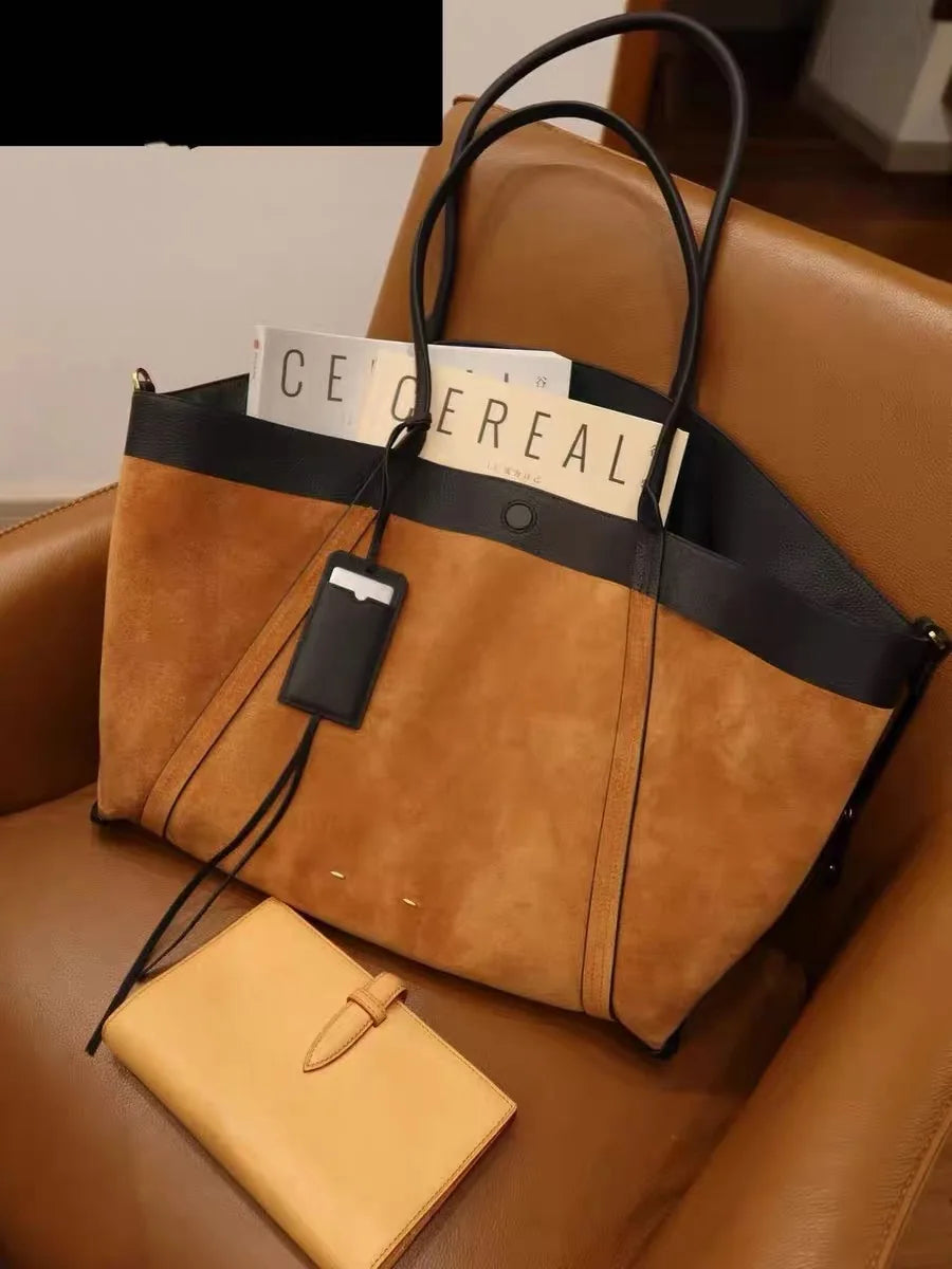 Large capacity casual tote with soft structured silhouette