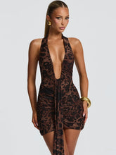 Leopard print ruched mini dress with deep plunge neckline for night outs