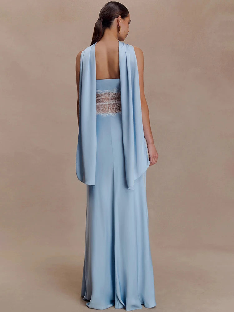 Close-up shows the sheer lace waist panel and delicate patchwork texture, creating a sculpted line between the bodice and skirt.