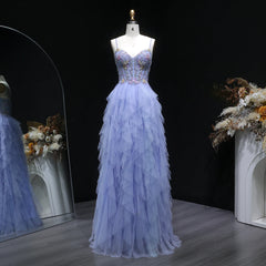 Beaded sequin bodice prom dress with spaghetti straps on model