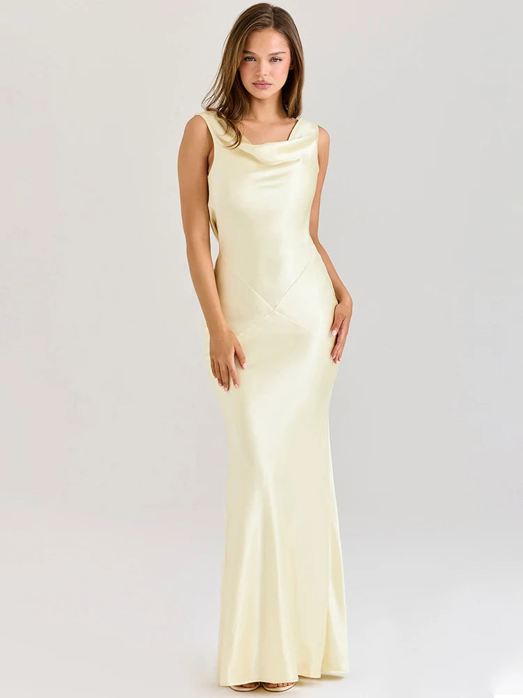 Light yellow cowl neck gown with pleated floor-length skirt