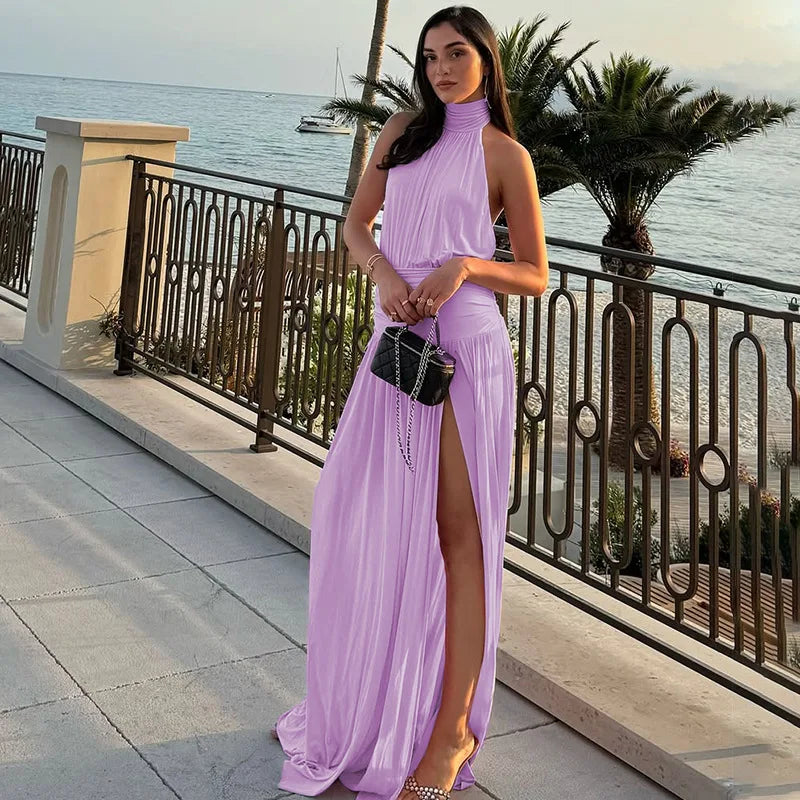 Lilac halter slit maxi dress styled for summer holidays by the sea