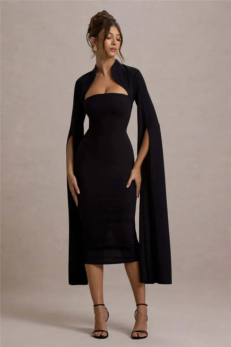 Elegant black cape dress styled for evening occasions