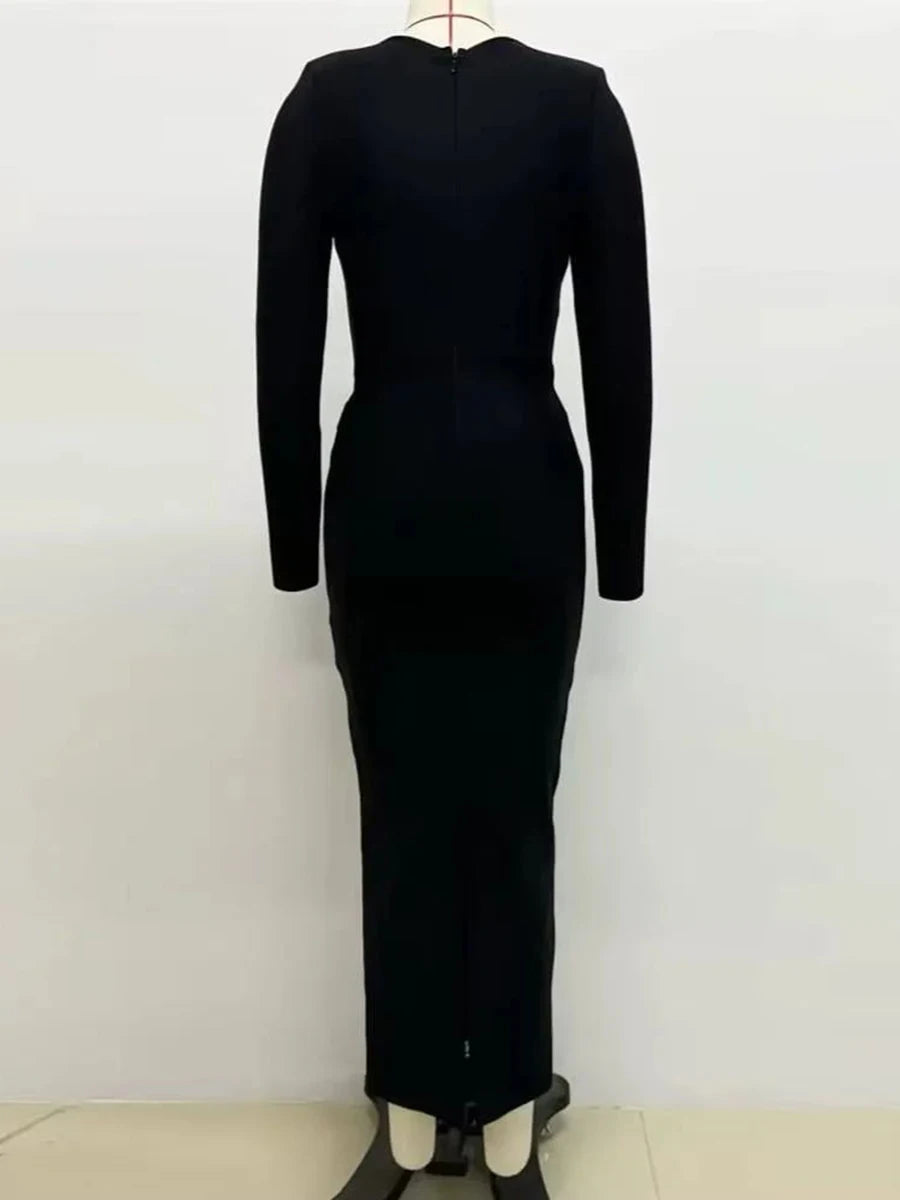 Structured black dress with shimmering decorative accents