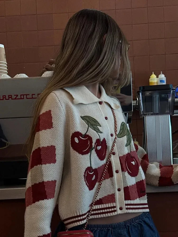 Long sleeve knit cardigan with button-front closure and regular length