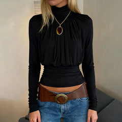 Minimal cropped turtleneck top with subtle shirring detail at the front