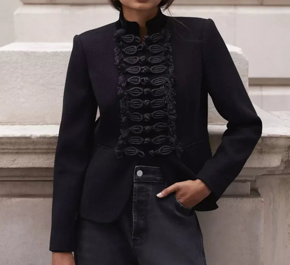 Long sleeve structured jacket styled with denim and boots