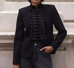 Long sleeve structured jacket styled with denim and boots