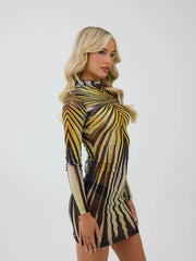 Woman wearing a front view of long sleeve bodycon printed clubwear dress on a white background