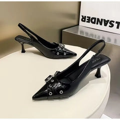 Black medium heel formal party shoes designed for all-day comfort on a white platform.