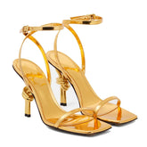 Metallic gold high heel wedding shoes with unique heel design