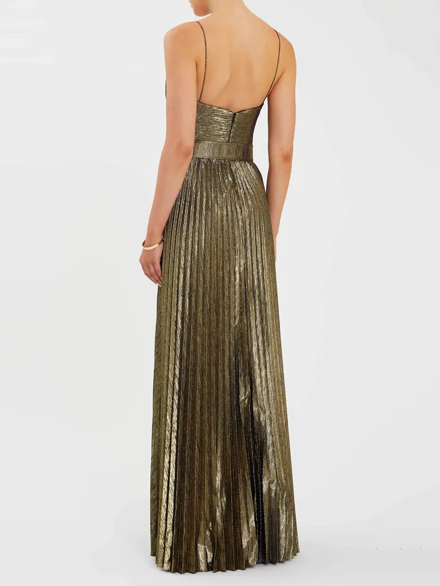Close-up of metallic pleated fabric and structured bodice detailing.