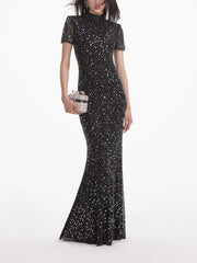 Black sequin evening gown on a white background