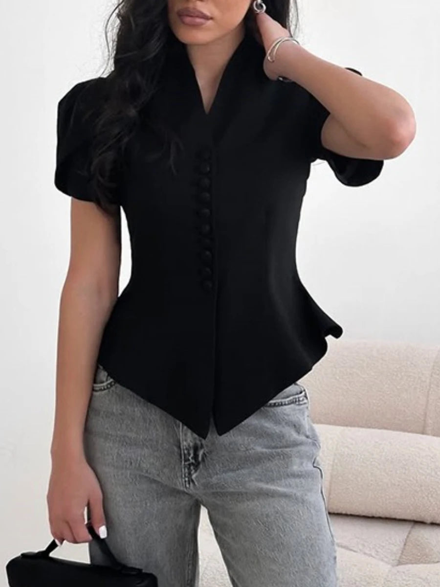 Minimalist black tailored blouse ideal for work and smart autumn casual edits