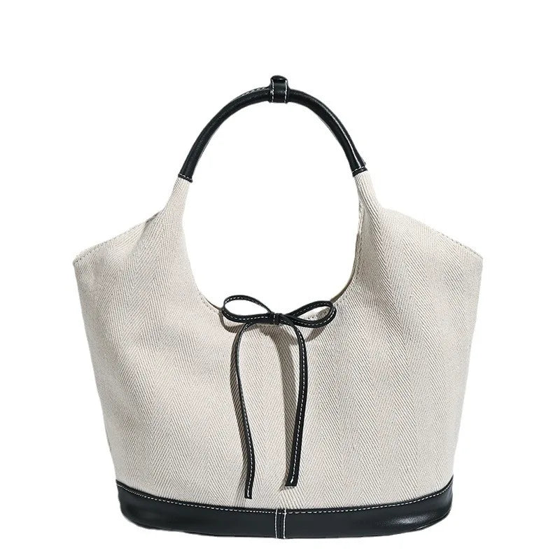 Minimalist canvas patchwork tote with black contrast accents
