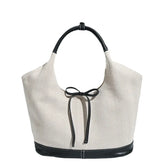 Minimalist canvas patchwork tote with black contrast accents