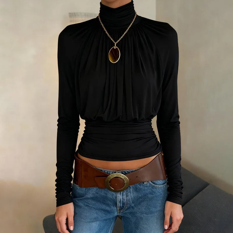 Sleek long sleeve cropped top designed for high-waist styling and layering