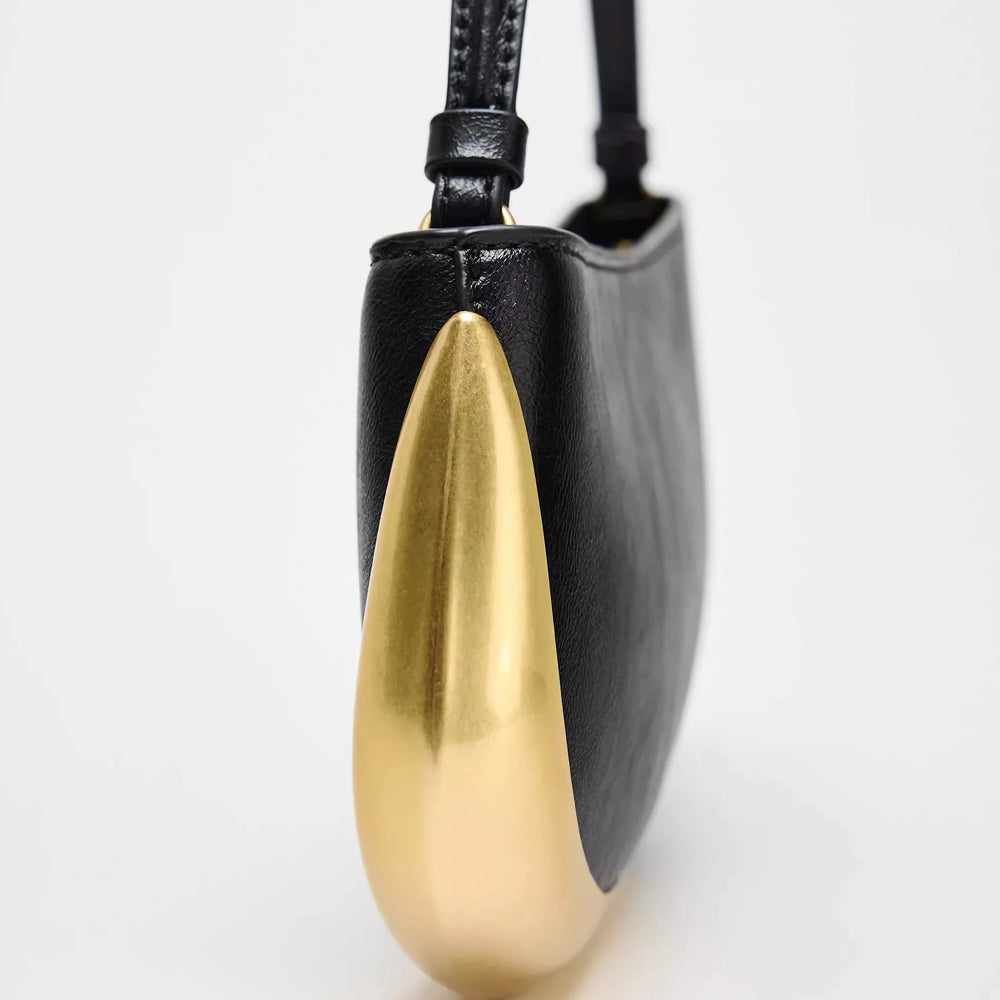 Minimalist black and gold shoulder purse for 2025 essentials