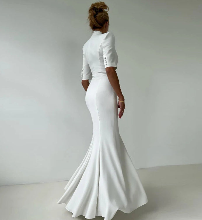 Minimalist white long dress for chic evening and holiday style