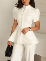 Minimalist white office blouse with sculpted sleeves and peplum waist