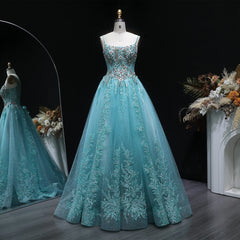 Full-length view of a floor-length tulle A-line gown with light shimmer