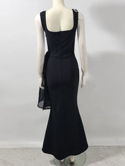 Modern embroidered black night dress with dramatic side bow for galas