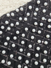 Modern one shoulder dot dress designed for statement retro-inspired events