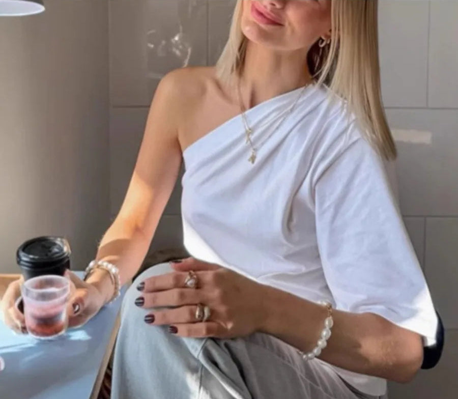 Clean streetwear-inspired white top with casual polish