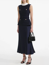 Navy buttoned skirt set styled for a professional office look