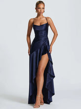 Navy satin spaghetti strap maxi party dress styled for formal events on a white background