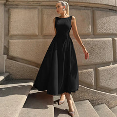 A front view of an O-neck dress, highlighting the pullover design and elegant silhouette.