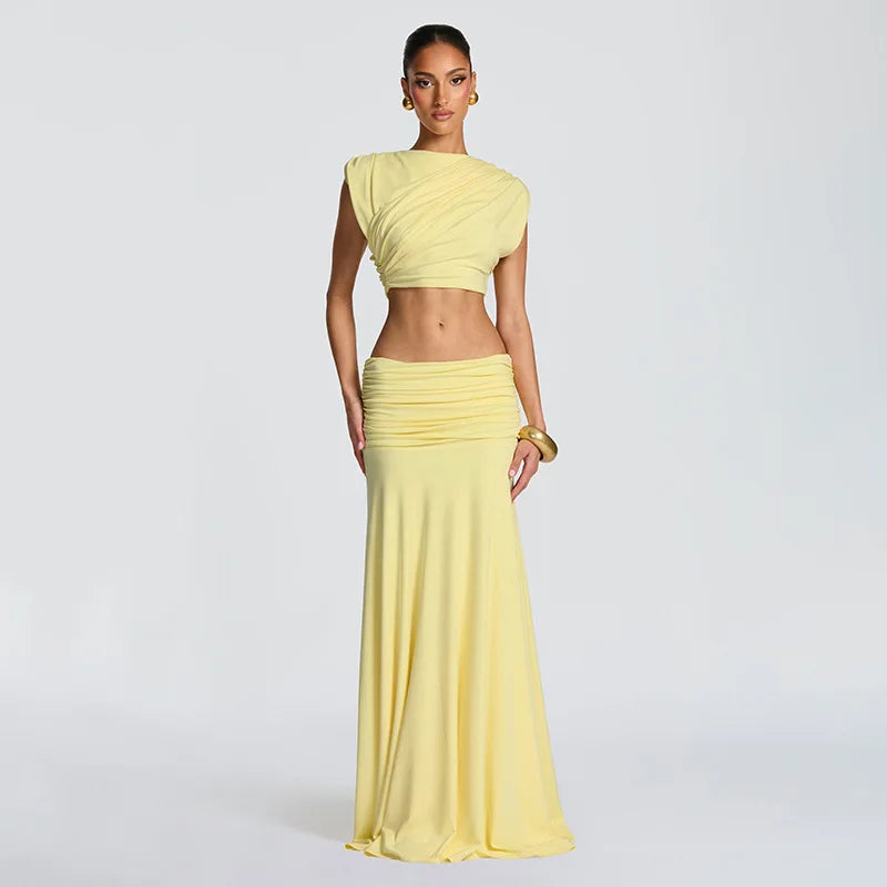 Matching pleated co-ord set styled as an elevated occasion outfit