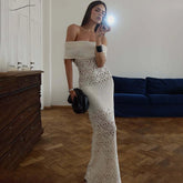 Off shoulder crochet knit maxi dress styled for summer vacation and resort events