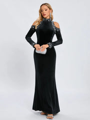 Off shoulder elegant long sleeve gown styled for runway and parties