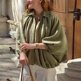Draped bomber jacket with lantern sleeves and turn-down collar