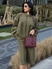 Olive green vintage matching set styled for outdoor brunch and travel