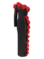 One-shoulder black dress with red flowers styled for evening events