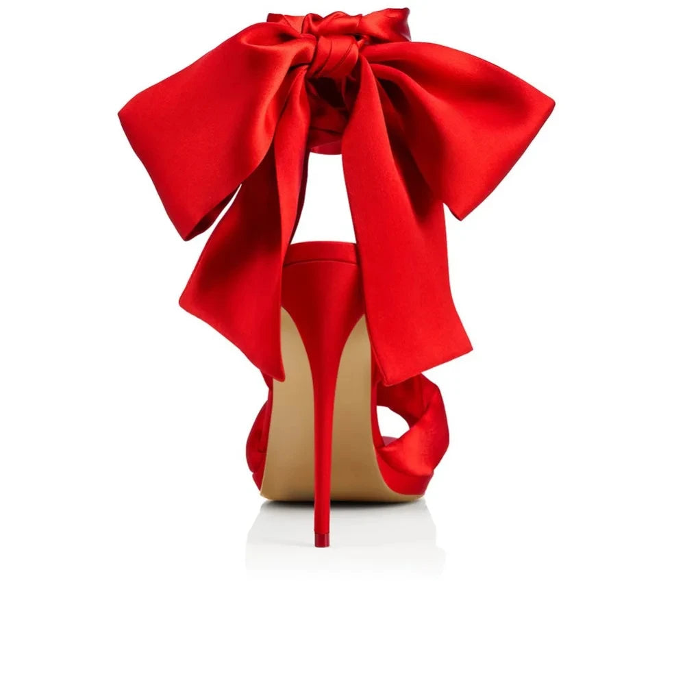 Oversized bow ankle party sandals in red satin for event looks