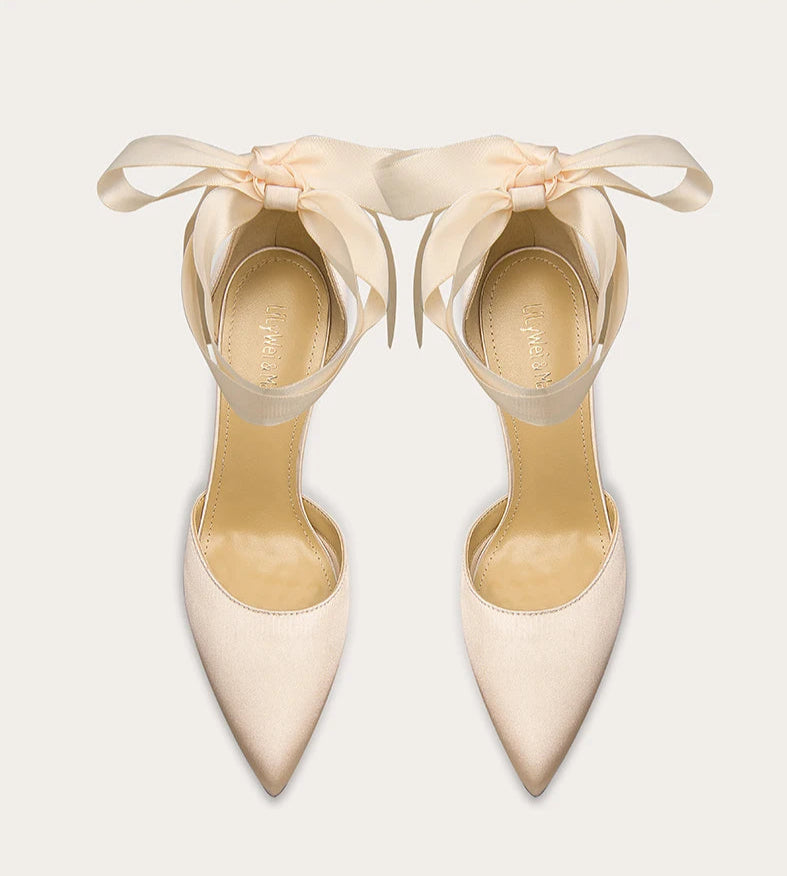 Oversized bow platform wedding heels for formal occasions