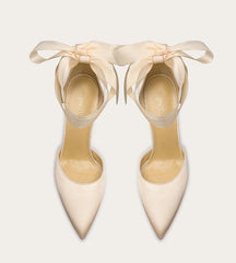 Oversized bow platform wedding heels for formal occasions