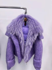 Close-up of voluminous fox fur trim on structured winter jacket
