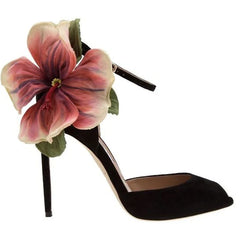 Black party backless peep-toe thin heel sandal with dramatic floral accent with a pink flower on a white background