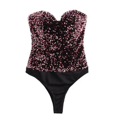 Pink shimmer strapless bodysuit.