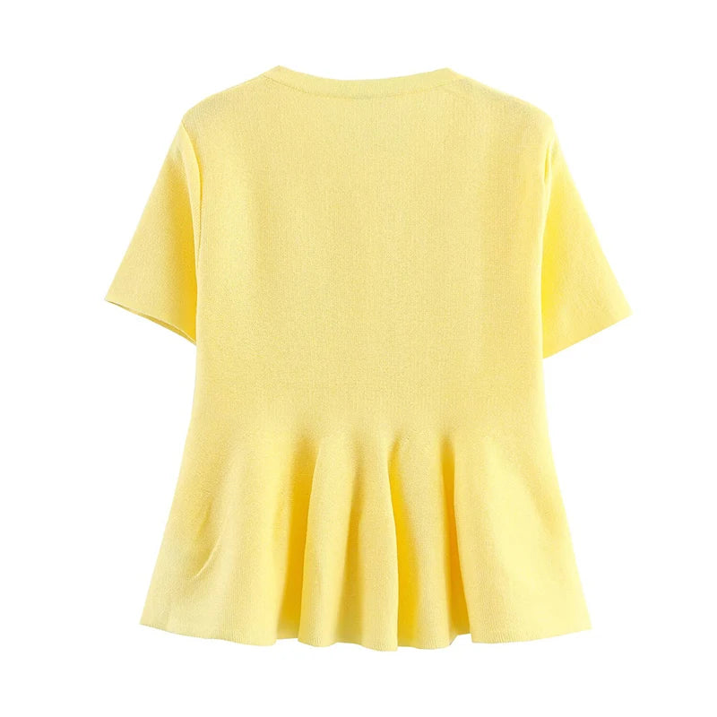 Minimalist yellow cardigan styled for spring or fall casual looks