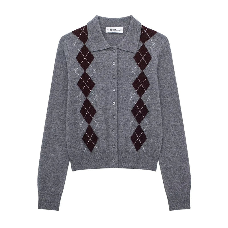 Close-up of diamond-pattern knit with slim buttoned shaping